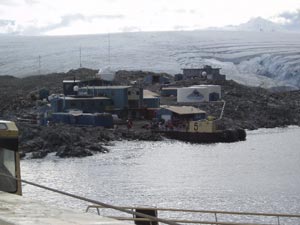 Palmer Station, Antarctica, as seen from the arriving L. M. Gould. The station, operated by the National Science Foundation, has been in its present location since 1967a small town on a rocky hill at the foot of a glacier. (Photo by K. Rakow)