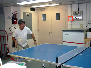 Another rainy-day pastime, ping-pong. In truth, the table's pretty busy when it's sunny too. Able Seaman Patrick Hennessy won this game, and with it the right to challenge the winner of a match between 2nd Assistant Engineer Marcel Vieira and Captain Gary Chiljean in the finals of this cruise's tournament. The scientists, naturally, were eliminated from competition pretty early on. 