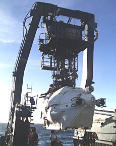The A-frame lifts Alvin off the deck. The sub weighs over 16 tons, so the A-frame has to be strong. 