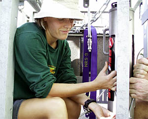 Jenny Engles installing the 12 kHz pinger on the Towed Camera Sled. 