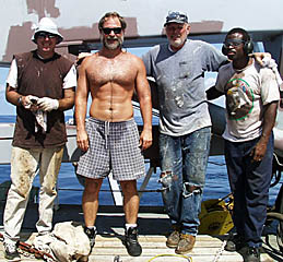 The “Deck Crew” - Mike Eubanks, Dave Murline, Bill Kamholz, Cletus Finnell - take a break from chipping rust and painting.