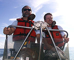 Capt. Eric Buck (right) and Dave Murline, Melville’s First Mate, enjoy a test run on one of the ship’s small boats.