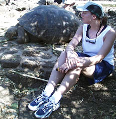 Julia Getsiv observes a Galapagos tortoise close-up at the Darwin Research Station yesterday. 