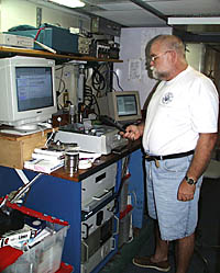 Chief Engineer Ron Wheatley checking one of R/V Melville’s main engines.