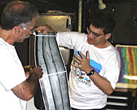 Mike Perfit checking navigation points for the DSL-120 sonar survey lines on the crest of the East Pacific Rise in the Main Lab of R/V Melville.