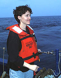 Mike Perfit checking navigation points for the DSL-120 sonar survey lines on the crest of the East Pacific Rise in the Main Lab of R/V Melville.