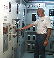 Ron at the electrical distribution center on R/V Melville. This is where all the electrical circuits are monitored and where power gets distributed. 