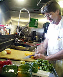 Knorr Cook Chris Poulin prepares pounds of peppers perfectly.  