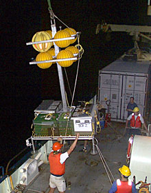 Loaded with 50 pounds of water sample bottles, vent markers and animal containers, the elevator leaves Knorr to make its first trip to the seafloor.  