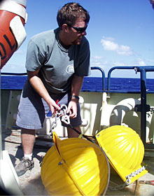Paul Johnson helps assemble the current meter mooring that was sent to the seafloor this evening.  