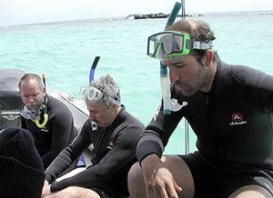 Joe Becker, Dan Fornari and Joe Licciardi (back to front) get their snorkeling gear on. 