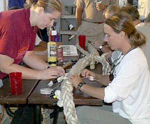  Lorna Allison (right) shows Kate Buckman the intricacies of rope knotting and splicing. 