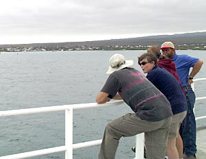 Joe Licciardi (left), Rhian Waller, Kate Buckman and JJ Becker watch Puerto Ayora getting closer.  
