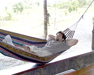  Joe Ferris relaxes in a hammock at ‘El Chato,’ the park restaurant near the lava tube.  