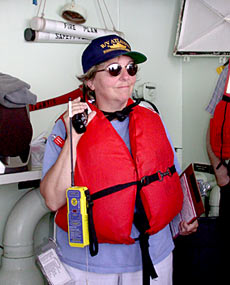 Chief Mate Mitzi Crane gives instructions to the scientific party during the Fire and Boat Drill today.