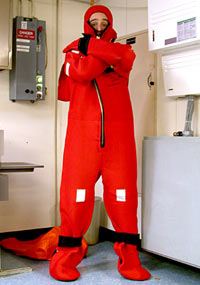  Lonny Lippsett tries out a survival suit, commonly known as a “gumby” suit.