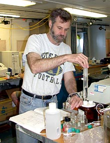  Kevin Roe sets up his analytical procedure for testing samples of bottom water brought up by Alvin for hydrogen sulfide.