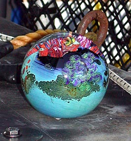Today’s Alvin crew placed a hand-blown glass “planet” made by artist 