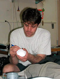 Scientist Jeff Mendez decorates a Styrofoam cup the night before his dive in Alvin. Cup-decorating is a ritual on board; the cups are put in a net bag and hung on the outside of the sub. As Alvin descends, the cups shrink as the water pressure increases. They make great souvenirs. Jeff is good at decorating Styrofoam mannequin heads, too, so we'll see what he comes up with tomorrow. 