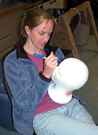 Monday is the last scheduled Alvin dive, and so it's the last chance for us to shrink stuff made out of Styrofoam. Here scientist Selene Eltgroth starts in on an ambitious project to cover an entire mannequin head with ink. It's always a mystery how the object will come out of the sub at the end of the day. 