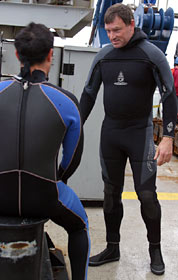 Before deploying the sub in 58-degree F water, Mark Spear (standing) and Raul Martinez donned wetsuits. “I’m from California,” Mark said, “so I’m used to Pacific temperatures.”