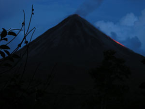 At night, WHOI scientists visiting Arenal Volcano watched red-hot lava flow down the upper slopes. 
