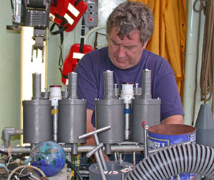 Expedition leader and Alvin pilot Pat Hickey ensures that instruments and research equipment are secure on the sub. (Photo by Dan Fornari)  