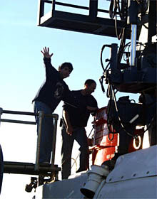 Craig Cary, one of the scientists, climbs into Alvin for the dive. 