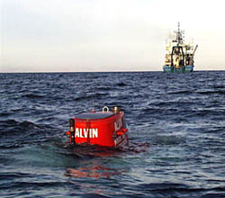 alvin in the water with atlantis in the background