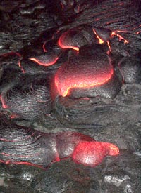  Pahoehoe toes forming in the active part of the Pu’u Oo flow, Kilauea volcano Hawaii in April, 2000. Scale across photo is about 2 meters. Photo by Bruce Applegate, HMRG.