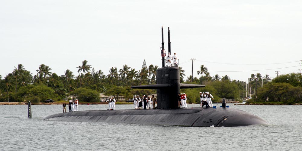 The nuclear-powered Los Angeles-class attack submarine USS Key West (SSN 722) cruises on the surface of the Pacific Ocean. 